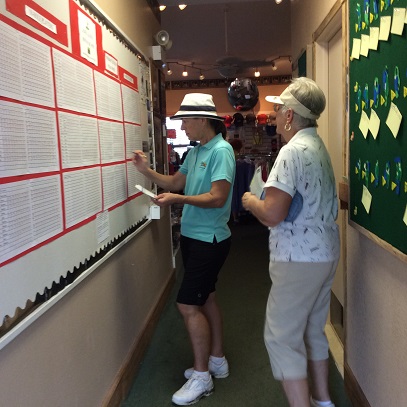 Enid Lundt and Vivian Gonsalves add scores to the ring board